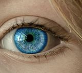 eye woman blue closeup