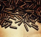 gun ammunition shells pile