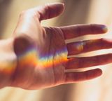 human hand reflection colorful